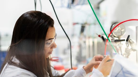 Isola Woman In Lab Card